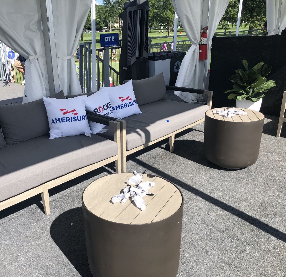 Custom Graphic Pillows on Grayson Sofa with Perth End Table Outdoors
